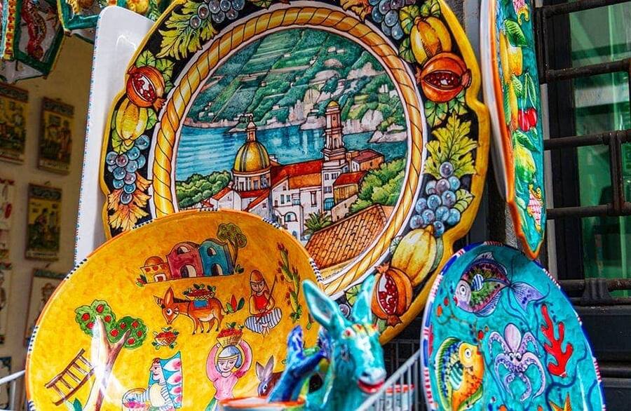 A watercolor sketch of the Coast, and hand-painted Vietri ceramics.